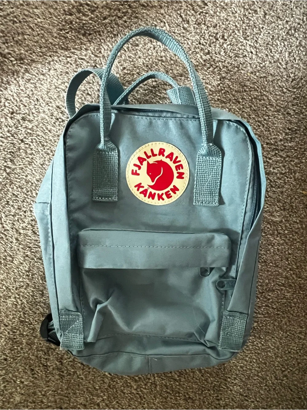 Fjallraven Kanken Mini Backpack in Teal Green with Red Logo